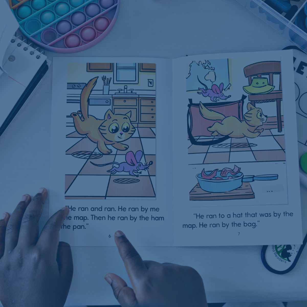 student reading book with hands