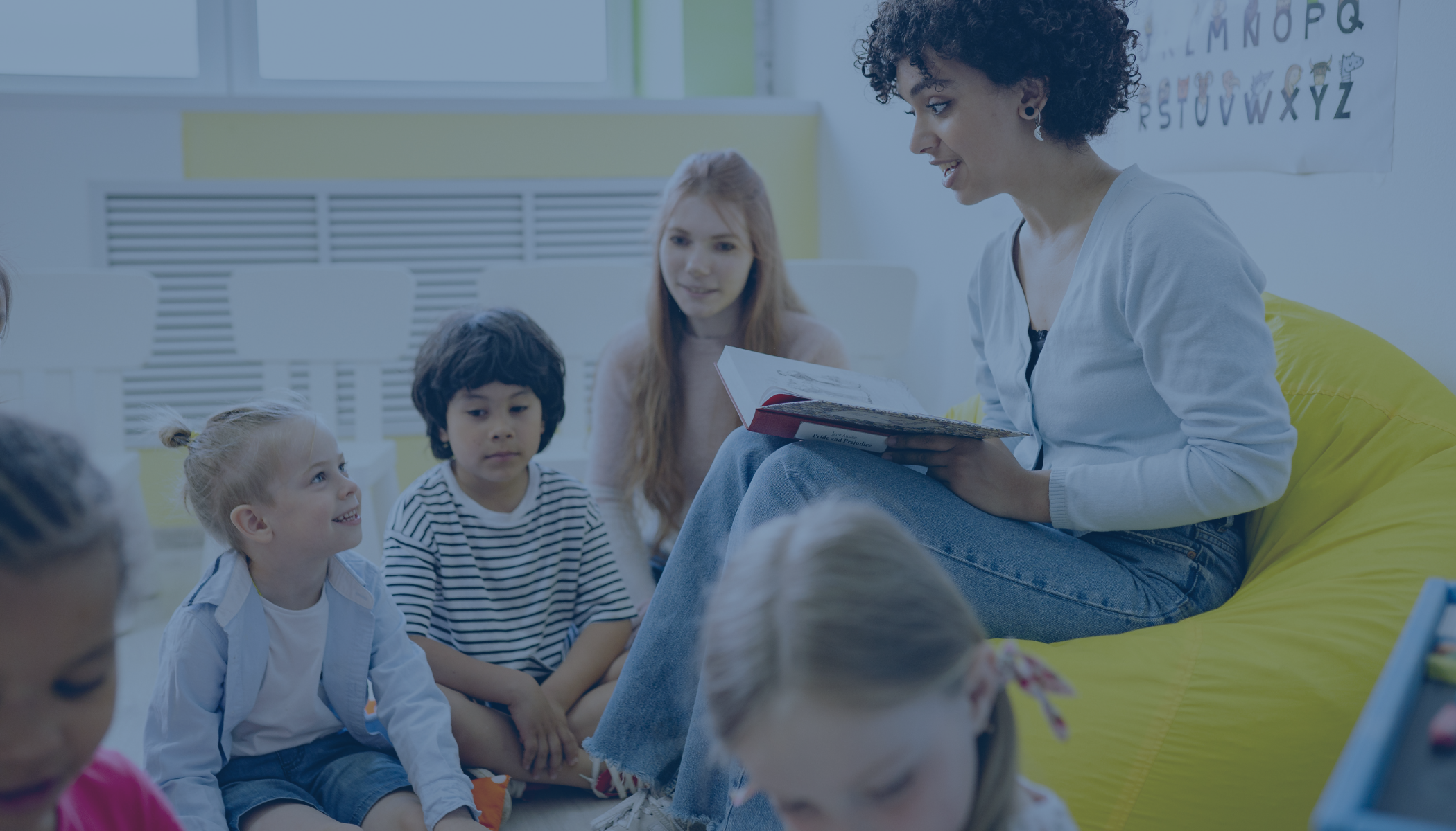 A teacher reading to students.