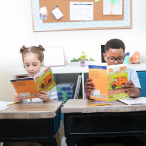 two children reading together
